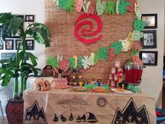 a table topped with lots of food and decorations