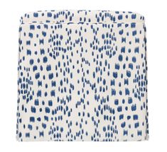 a white and blue animal print blanket with spots on it's back, against a white background