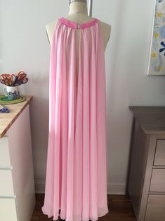 Pink peignoir gown. Chiffon material. Magnetic clasp in back, open sides for better movement. Gown has a sit in back for easy removal. Long fabric belt included. I can create this item in any color, please message me. Pink Maxi Dress With Back Opening For Evening, Pink Flowy Floor-length Gown, Pink Maxi Dress For Wedding Night, Pink Flowy Gown For Party, Pink Long Evening Gown, Pink Long Gown For Evening, Pink Floor-length Gown For Wedding Night, Floor-length Pink Gown For Wedding Night, Gown Chiffon