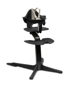 a black high chair with two baby seats on it's legs and the seat up