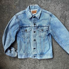 "Very cool wear on this 70s Levi's cotton denim jean jacket.  Some fades and faint spots of discoloration throughout (see photos).  Repair by original owner on the back of the right sleeve (see photos). WPL 423 Measurements, laying flat: 18.5\" Pit to Pit 18\" Pit to end of Cuff 17\" Shoulders, seam to seam 25\" Top of Collar to Bottom of Garment" Vintage Pre-washed Medium Wash Denim Jacket, Retro Faded Washed Denim Jacket, Faded Long-sleeve Pre-washed Denim Jacket, Faded Pre-washed Cotton Denim Jacket, Faded Long Sleeve Pre-washed Denim Jacket, Long Sleeve Faded Pre-washed Denim Jacket, Vintage Faded Distressed Denim Jacket, Vintage Distressed Faded Outerwear, Vintage Faded Pre-washed Outerwear