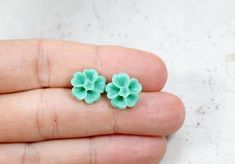 Sakura Blossom Earrings - pretty flower earrings on stainless steel posts. This listing is for the Blossom Earrings in mint green. Stud earrings are about 12mm in size. (about 1/2 inch)Click here to go back to my shop: http://lotusandbliss.etsy.com Green Stud Earrings, Sakura Blossoms, Mint Green Earrings, Earrings Pretty, Pretty Flower, Earrings Green, Green Flower, Green Earrings, Botanical Flowers