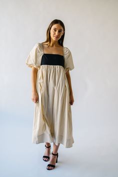 Get ready to slay in the Ambreen Puff Sleeve Maxi Dress! This unique dress features trendy puff sleeves and a flattering maxi length. The beige color adds a touch of sophistication, making it perfect for any special occasion. Stand out in style with this playful and chic dress! Details self: 100% cotton lining: 100% polyester Fabric Care Guide Here Sizing & Fit Measurements are approximate and taken while laying flat across the front. Not doubled. x-small: bust = 15"; length = 45" small: bust = Chic Puff Sleeve Dress With Voluminous Fit For Daywear, Summer Cream Dress With Balloon Sleeves, Chic Voluminous Puff Sleeve Dress For Daywear, Cream Balloon Sleeve Summer Dress, Summer Cream Balloon Sleeve Dress, Spring Maxi Dress With Elastic Puff Sleeves, Summer Cream Midi Dress With Gathered Sleeves, Billowy Puff Sleeve Maxi Dress For Daywear, Chic Cream Midi Dress With Gathered Sleeves