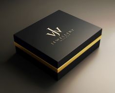 a black and gold box with the letter w on it