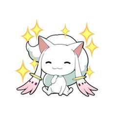 a white cat sitting on top of a pile of stars