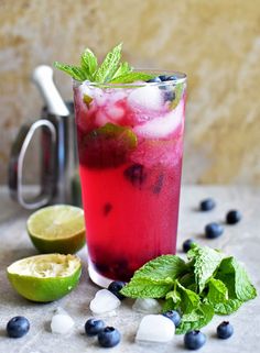 two glasses filled with watermelon and mint garnish