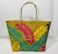 "Meticulously handwoven Ticog bags were created by expert Filipino weavers, usually in small villages, in the Bicol Region of the Philippines. The century old tradition of weaving has been passed down from generation to generation. The \"Paraglaras\" or the weavers, usually women, were taught at an early age to develop this weaving skill.  Ticog/Tikog is an indigenous material that is soft but durable, and becomes smoother from constant use. This special reed grasses that are found in swampy are Samar Philippines, Bicol Region, Regions Of The Philippines, Environmental Awareness, Floral Bags, Top Handle Bags, Samar, Design Web, Nature Design