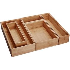 three wooden trays sitting on top of each other