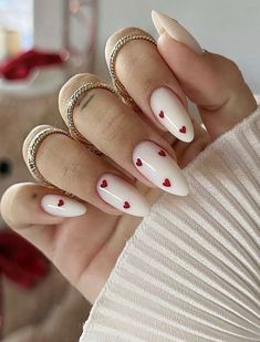 Long Almond Red heart & White base Press on Nails. These nails are easy to apply and can be customized to your desired length and shape. Each set comes with 24 pieces, so you'll have plenty of options to create the perfect look for your nails. Whether you're a nail art enthusiast or just looking for a quick and stylish solution, our Long Almond Red Heart & White Press On Nails are a must-have addition to your collection. Treat yourself or surprise someone special with these gorgeous nails that w Spring Manicure, Milky Nails, February Nails, Her Nails, Red Nail, Spring Nail, Heart Nails, Valentine's Day Nails