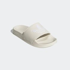 Style No. H05679 Color: Off White/Cloud White/Off White adidas Women's Originals Adilette Lite Slides - Cream. Cream Adidas, Adidas Slippers, Slides Adidas, Pool Shower, Adidas Adilette, White Cloud, Cloud White, Adidas Online, White Adidas