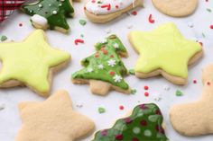 decorated christmas cookies on a white surface