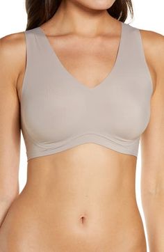 Supersoft fabric and a wireless design give you the support you need in this V-neck bra that hugs curves and disappears under clothing. 77% nylon, 23% elastane Hand wash, line dry Imported Women's Clothing Soft Touch Stretch V-neck Bra, V-neck Sports Bra With Removable Pads, Solid Color V-neck Sports Bra With Removable Pads, V-neck Stretch Bra With Soft Touch, Seamless Stretch V-neck Nursing Bra, Low-cut Stretch Sports Bra With Soft Touch, Seamless V-neck Shapewear Intimate, Stretch Nursing Bra With Medium Bust Support, V-neck, Stretch V-neck Nursing Bra With Medium Bust Support