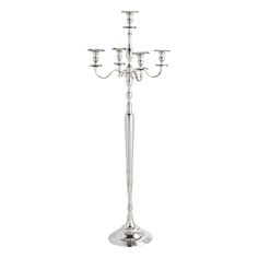 a metal candelabra with five candles on it