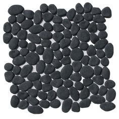 black pebbles are arranged on a white background