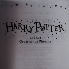 an open book with harry potter and the order of the phoenixix written on it