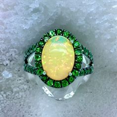 Natural Quality Opal Tsavorite Ring Size 7 14k Gold 5.66 TCW Certified $5,950 300686This is a one of a Kind Unique Custom Made Glamorous Piece of Jewelry!Nothing says, “I Love you” more than Diamonds and Pearls!This item has been Certified, Inspected, and Appraised by Gemological Appraisal LaboratoryGemological Appraisal Laboratory of America is a proud member of:- GIA Alumni Association- National Association of Jewelry Appraisers- International Consortium Gem-Testing Laboratories- Gemological A Oval Multi-stone Emerald Ring, Oval Multi-stone Tsavorite Rings, Oval Tsavorite Multi-stone Ring, Green Multi-stone Emerald Rings, Green Multi-stone Emerald Ring Fine Jewelry, Fine Jewelry Green Multi-stone Emerald Ring, Fine Jewelry Green Sapphire Multi-stone Ring, Fine Jewelry Green Multi-stone Sapphire Ring, Gia Certified Green Oval Ring