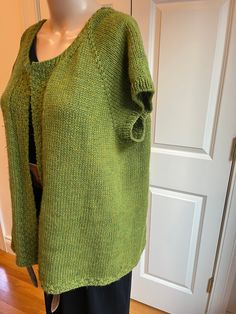 Very good condition. No flaws. Armpit to armpit: 27in.; Armpit to hem: 17in. Wool. No closure. Fitted Green Sweater Vest For Fall, Fitted Green Sweater Vest For Spring, Green Winter Vest Top, Green Vest Top For Fall, Green Fitted Sleeveless Sweater Vest, Fitted Green Sleeveless Sweater Vest, Fitted Green Vest For Fall, Fitted Green Casual Sweater Vest, Green Vest