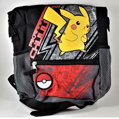 Pokemon Pikachu Kids Mini Backpack "Gotta Catch 'Em All!" Feautures: Officially Licensed Backpack By Bioworld Roll-Top 11.5" Front Zipper 2 Side Netted Pockets Adjustable Straps Polyester Cute And Collectible Perfect As A Gift For All Pokemon Fans Estimated Size: 11.5" (H) X 8.5" (W) X 3: (D) Playful Black Bag For Back To School, Black Character Backpack For Everyday Use, Cartoon Style Black School Bag, Black Cartoon Bags For School, Cartoon Black School Bag, Novelty Black School Bag, Novelty Black Standard Backpack, Black Novelty Standard Backpack, Pokemon Backpack