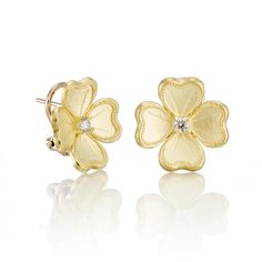 Heralding the arrival of spring, dogwood blossoms are faithfully re-created in 18-karat yellow gold and finished with a diamond pastil. Since 1861, Gump's has been a destination for jewelry that is distinctive and timeless. Featuring only the finest materials, each piece is a statement of elegance. Diamonds, 0.15ctw. 18-karat yellow gold. Pierced or clip. 5/8" long. Wedding Flower Earrings In 14k Yellow Gold, Luxury Yellow Gold Flower Earrings, Classic Flower Shaped Jewelry With Single Cut Diamonds, Classic Flower-shaped Jewelry With Single Cut Diamonds, Luxury Brilliant Cut Flower Earrings For Anniversary, Luxury Gold Flower Earrings For Anniversary, Luxury Yellow Gold Flower Shaped Diamond Earrings, Luxury Yellow Gold Flower Earrings For Formal Events, Luxury Yellow Gold Flower Earrings For Formal Occasions