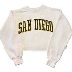 White Coastal San Diego California Longsleeve Crop Top Crewneck Lounge Sweatshirt S Next Day Shipping White Coastal San Diego California Longsleeve Crop Top Crewneck Lounge Sweatshirt S No Returns, All Sales Final. Model Is 5'4. Size S. Message Me With Questions! Prices Are Firm. Most Items Are Vintage (20+ Years) And Aren’t Perfect And May Contain Minor Flaws, But Still Good Wearable Condition! Major Flaws Will Be Described. #Deadstock #Nwt #Nike #Athletic #Vintage Long-sleeve Tops With Text Print For College, Vintage Tops For College, College Style White Tops For Fall, White College Style Tops For Fall, College Style Long Sleeve Tops With Letter Print, Crop Crewneck, Lime Green Shorts, Seersucker Pants, Nike Tennis Dress