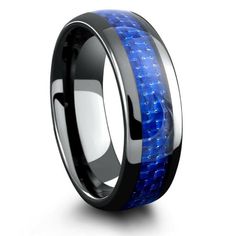 a blue and black ring with carbon fiber inlay