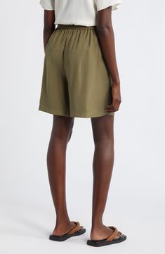 Slip into the casual ease of loose-fitting shorts topped with a comfortably customizable drawstring waist. Elastic/drawstring waist 91% viscose, 9% polyester Machine wash, line dry Imported Summer Viscose Bottoms For Loungewear, Relaxed Fit Viscose Bottoms For Vacation, Green Bottoms With Elastic Waistband For Daywear, Summer Bottoms With Gathered Waist And Relaxed Fit, Relaxed Pajama Shorts With Elastic Waistband, Green Bermuda Bottoms With Elastic Waistband, Green Loungewear Bottoms With Tie Waist, Relaxed Fit Shorts With Drawstring, Relaxed Fit High-waisted Pajama Shorts With Drawstring