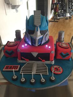 a birthday cake made to look like a robot from the movie's tv series