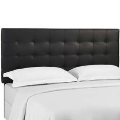 a black headboard with white sheets and pillows on top of the bed, against a white background