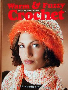 a woman wearing a knitted hat and scarf on the cover of a knitting book