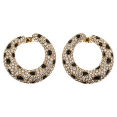 These exquisite Cartier Panthère Onyx Diamond Yellow Gold Vintage Hoop Earrings are a testament to the iconic elegance and craftsmanship synonymous with the Cartier brand. Crafted from the finest 18k yellow gold, these earrings are designed to capture the light and the admiration of any room. The design is both classic and daring, featuring an intricate arrangement of 10 carats appx of round brilliant cut diamonds that shimmer with unmatched brilliance. Luxury Vintage Single Earring, 1stdibs Earrings, 1stdibs Jewelry, Cartier Earrings, Cartier Panthere, Cartier Jewelry, Jewelry Earrings Hoops, Round Brilliant Cut Diamond, Girls Best Friend