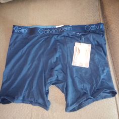 These Boxer Briefs Are Brand New With Tags Has A Logo Calvin Klein On The Waistband There's No Openings And That's A Large Calvin Klein Sports Boxer Briefs, Blue Multi-pack Boxer Briefs, Calvin Klein Fitted Casual Shorts, Calvin Klein Boxer Briefs, Calvin Klein Boxers, Mens Trunks, Klein Blue, Calvin Klein Men, Fitted Skirt