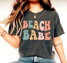 Beach Babe Shirt, Beach Shirt, Summer Beach Shirt, Summer Shirt, Beach Vibes Shirt, Beach Lover Shirt, Vacation Shirt, Vacay Mode Shirt We create custom t-shirts with great designs for everyone's liking. If you don't find the size or color you would like, please message us and we will be happy to accommodate! PRODUCT We use the finest premium Bella Canvas shirts for you, they are feather soft and very breathable with a good stretch. These t-shirts are known for their great quality and much loved by our consumers. SIZING This t-shirt comes in UNISEX sizing. It looks great on both men and women, but women are recommended to order a size down for a fitted look! Please refer the sizing chart to find your perfect fit! COLORS Colors on screen and the printed product may slightly vary due to scre Water Shirt, Lake Life Shirt, Babe Shirt, Vacay Mode, Squad Shirt, Beach Lover, Spirit Wear, Beach Shirt, Lake Life