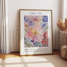 an image of a framed bible verse with flowers