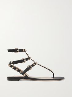 VALENTINO GARAVANI The Rockstud leather sandals | NET-A-PORTER Designer Spiked Ankle Strap Sandals, Designer Ankle Strap Sandals With Spikes, Luxury Spiked Sandals For Summer, Designer Calf Leather Sandals With Studded Outsoles, Designer Spiked Sandals For Summer, Designer Evening Sandals With Spikes, Cage Sandals, Valentino Garavani Shoes, Caged Sandals