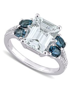 A gorgeous emerald-cut aquamarine is flanked by stunning blue topaz shoulder stones on this beautiful ring with diamond accent detail, from Delmar. Macy's Silver Rings With Gemstone, Macy's Silver Gemstone Rings, Classic White Sapphire Emerald Cut Ring, Classic Macy's Diamond Ring With Accent Stones, 14k White Gold Jewelry With Baguette Cut, Macy's Classic Diamond Ring With Accent Stones, White Sapphire Rings With Diamond Accents, Luxury White Blue Topaz Jewelry, Formal White Rings With Accent Stones