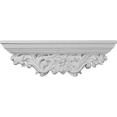 a white shelf with an ornate design on the top and bottom, against a white background