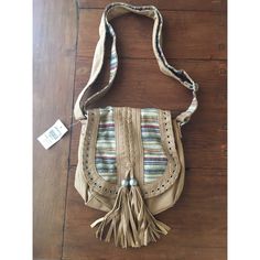 Deadstock! Buff Vegan Leather Crossbody Bag With Striped Tapestry Front Panel & Inner Strap. Whipstitch, Braiding & Tassel Detailing On Front. Magnetic Flap Closure, Inner Zip & Slip Pockets. Saddlebag Shape. New With Tags!!! Beige Hobo Shoulder Bag For Festival, Bohemian Cream Bags For Festival, Bohemian Cream Hobo Bag For Travel, Beige Crossbody Shoulder Bag For Festivals, Beige Bag With Adjustable Strap For Festival, Bohemian Cream Hobo Shoulder Bag, Bohemian Cream Crossbody Shoulder Bag, Beige Bohemian Crossbody Hobo Bag, Bohemian Cream Crossbody Bag