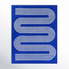 the letter s is made out of blue paper with white lines on it's side