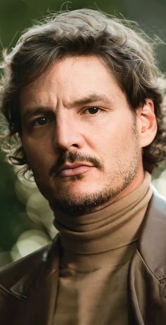 a close up of a person wearing a leather jacket and turtle neck sweater with long hair