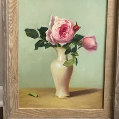 a painting of pink roses in a white vase