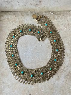 Beautiful Middle Eastern Turquoise Gold gilt Silver Mesh Chain mill Vintage Bib Festoon Necklace  Lovely filigree dangles draping around the bottom  necklace Beautiful, nice weight to to, necklace is sterling silver with gild gilt, the clasp is just a metal with gold gilt, gold on clasp is slightly wear of at points Approx 17 inches around Bohemian Gold Chain Necklace, Bohemian Gold Chain Necklace For Festivals, Turquoise Metal Chain Necklace, Bohemian Turquoise Jewelry With Chain, Vintage Gold Beaded Turquoise Necklace, Festoon Necklace, Bib Necklaces, Middle Eastern, Sterling Silber