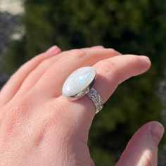 Moonstone ring set in .925 sterling silver made by hand in Utah. Ring pictured is size US 6.5, can be remade with a different gem shape for multiple sizes. Spiritual Moonstone Ring With Large Stone In Sterling Silver, Spiritual Sterling Silver Moonstone Ring With Large Stone, Spiritual Large Stone Moonstone Ring In Sterling Silver, Spiritual Large Stone Sterling Silver Moonstone Ring, Handmade Silver Moonstone Ring In Celestial Style, Silver Mystical Moonstone Ring, Spiritual Sterling Silver Moonstone Ring With Natural Stones, Spiritual Open Ring Moonstone In Sterling Silver, Celestial Oval Moonstone Ring In Sterling Silver