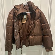 Gap Women’s Puffer Jacket Size: X-Large Color: Brown Brand New! A Cute Warm Jacket! This Jacket Is In Style And Can Be Worn With A Lot! Material Is Silky. Great Condition As It Being New And Never Worn. Gap Puffer Jacket, Brown Hooded Puffer Outerwear, Gap Outdoor Outerwear With Pockets, Trendy Brown Puffer Outerwear, Casual Gap Outerwear, Gap Winter Outerwear In Solid Color, Gap Hooded Spring Outerwear, Brown Puffer Outerwear For Cold Weather, Trendy Gap Long Sleeve Outerwear