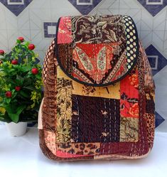 "( 1 ) Item - Kantha Work Backpacks Is Made Of High Quality Construction ( 2 ) Adjustable shoulder straps are well padded for ease of carrying. It has four external zip pockets for your quick access items. ( 3 ) Dimensions: 18\" inches x 13\" inches x 4\" inches (Height x Width x Depth). ( 4 ) If you are looking for a natural Kantha Work Laptop & Backpack, then for you A Must Buy Product which is uniquely designed in Indian Tradition Look ( 5 ) Wash Care, Hand Washable Bag" Bohemian Beige Backpack, Bohemian Beige Rectangular Backpack, Patchwork Backpack For Daily Use, Everyday Use Standard Backpack With Patchwork, Standard Patchwork Backpack For Everyday Use, Everyday Patchwork Standard Backpack, Traditional Multicolor Rectangular Backpack, Bohemian Brown Shoulder Backpack, Flower Wall Decor Diy