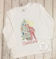 "Boy adding star Christmas tree embroidered shirt To order: - please leave personalization in comments at check out so your order does not get delayed.  Please list  name- thread color Hair color -blonde, brown, red or black -If you do not want personalization, please state \"no personalization\" ." Long Sleeve Embroidered Tops For Holiday, Red Embroidered Holiday Tops, Embroidered Shirt, Make Design, Blonde Hair Color, Kids Tops, Black And Red, Gender Neutral, Hair Color