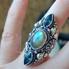 Brand New Handmade Oversized Labradorite And Blue Topaz Silver Statement Ring. Size 8 925 Stamped New To Poshmark? Use Referral Code Kimberlyn222 To Receive $10. Silver Sapphire Ring With Gemstone Accents In Sterling Silver, Silver Topaz Ring For Jewelry Making, Silver Topaz Ring With Gemstone Accents In Sterling Silver, Turquoise Sapphire Ring In Sterling Silver, Turquoise Sapphire Ring With Sterling Silver, Blue Crystal Sterling Silver Ring Stamped 925, Turquoise Sapphire Gemstone Ring In Sterling Silver, Blue Labradorite Moonstone Ring, Blue Labradorite Ring