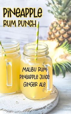 two mason jars filled with pineapple rum punch