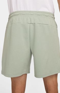 Whether hanging out of hitting the gym, comfort is key in these versatile shorts made with handy pockets for essentials and the brand's Dri-FIT moisture-wicking technology. 7" inseam; 24" leg opening; 10" front rise; 12 1/2" back rise (size Medium) Elastic/drawstring waist Hidden side-zip pockets; back drop-in pocket Dri-FIT moisture-wicking technology 78% polyester, 22% cotton Machine wash, dry flat Imported Sporty Bermuda Bottoms With Built-in Shorts, Sports Bermuda Shorts With Built-in Shorts, Functional Shorts With Elastic Waistband And Relaxed Fit, Functional Relaxed Fit Shorts With Elastic Waistband, Functional Relaxed Fit Bottoms With Built-in Shorts, Leisure Athletic Shorts With Built-in Shorts, Gym Shorts With Relaxed Fit And Short Inseam, Casual Go-dry High-waisted Shorts, Gym Shorts Relaxed Fit