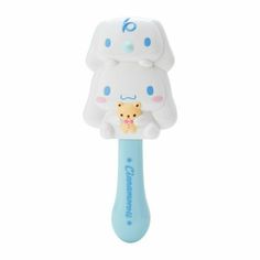 a toothbrush with an animal on it