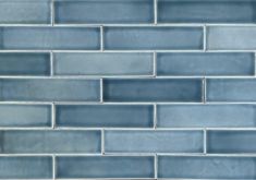 a close up view of a blue glass tile backsplash that looks like it could be used in a kitchen or bathroom